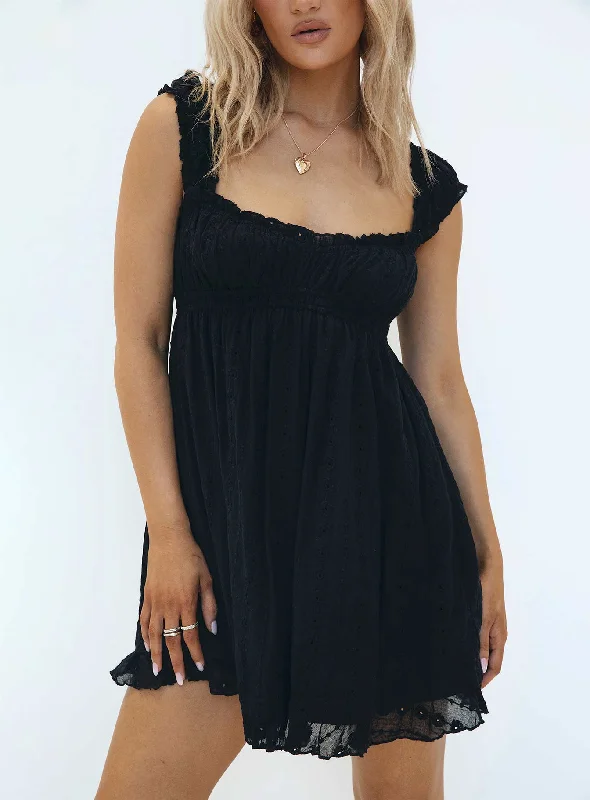 Flowy dresses for a relaxed yet chic evening party - -Flowy dresses with metallic accents and glitter for parties and celebrations to shine and impress -Carlita Mini Dress Black Flowy dresses for a relaxed yet chic evening party - -Flowy dresses with metallic accents and glitter for parties and celebrations to shine and impress -Carlita Mini Dress Black