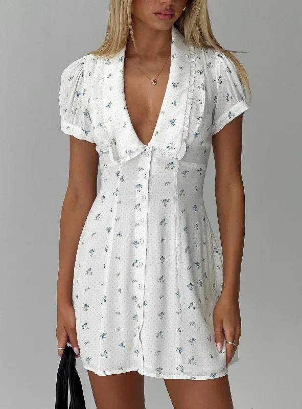 Flowy dresses for a bohemian vibe at a music festival - -Formal flowy dresses with sophisticated designs and luxurious fabrics for formal galas and high-end events -Fabiola Collared Mini Dress Floral Flowy dresses for a bohemian vibe at a music festival - -Formal flowy dresses with sophisticated designs and luxurious fabrics for formal galas and high-end events -Fabiola Collared Mini Dress Floral