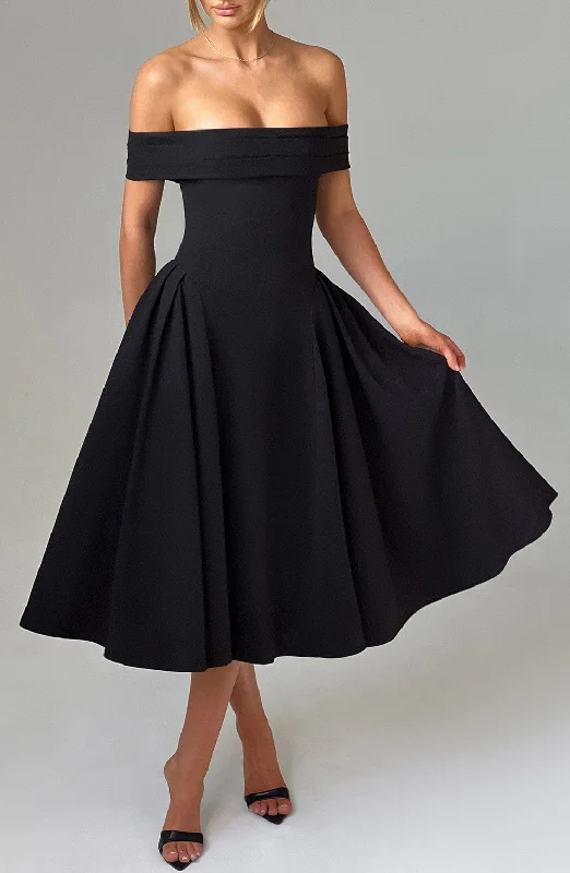 How to style a flowy dress for a cold spring day - -Flowy dresses with sustainable materials and innovative technology integration -Miranda Midi Dress - Black How to style a flowy dress for a cold spring day - -Flowy dresses with sustainable materials and innovative technology integration -Miranda Midi Dress - Black