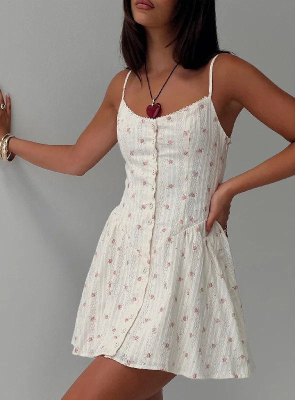 Flowy dresses with lace detailing for a feminine touch - -Flowy dresses with unique accessories and embellishments for special occasions and events to stand out and shine -Toulouse Mini Dress Cream / Floral Flowy dresses with lace detailing for a feminine touch - -Flowy dresses with unique accessories and embellishments for special occasions and events to stand out and shine -Toulouse Mini Dress Cream / Floral