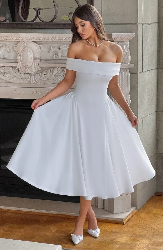 Flowy dresses with open backs for an elegant look - -Formal flowy dresses for formal galas with unique cultural influences -Miranda Midi Dress - Ivory Flowy dresses with open backs for an elegant look - -Formal flowy dresses for formal galas with unique cultural influences -Miranda Midi Dress - Ivory
