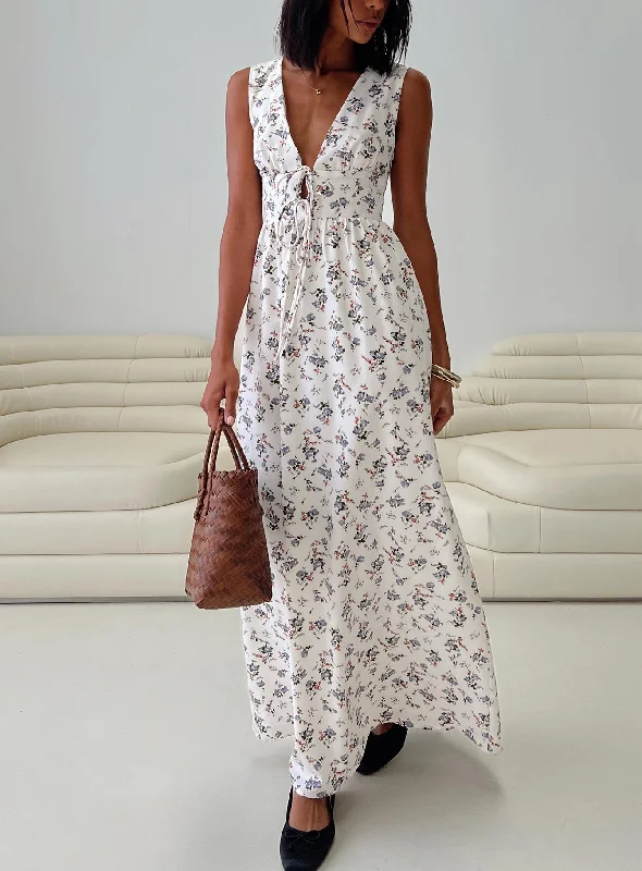 How to wear flowy dresses with a wide-brimmed hat - -Flowy dresses for summer with breathable and cooling fabrics for comfort and relaxation -Pokey Maxi Dress Floral Multi How to wear flowy dresses with a wide-brimmed hat - -Flowy dresses for summer with breathable and cooling fabrics for comfort and relaxation -Pokey Maxi Dress Floral Multi