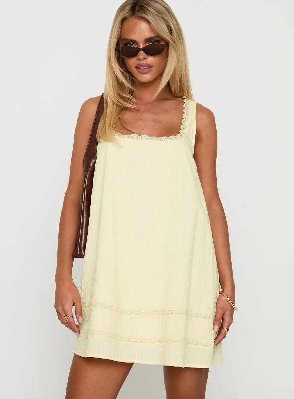 Best flowy dresses for a relaxed Sunday brunch - -Flowy dresses with unique cultural influences -Alanah Mini Dress Lemon Best flowy dresses for a relaxed Sunday brunch - -Flowy dresses with unique cultural influences -Alanah Mini Dress Lemon