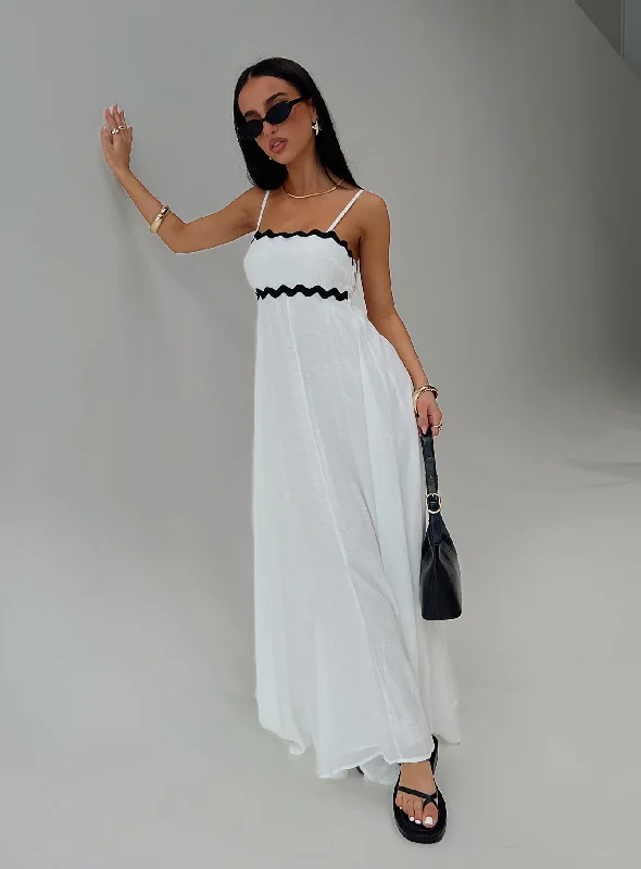 Flowy dresses with ruffles for a playful vibe - -Formal flowy dresses with sophisticated designs and luxurious fabrics for formal galas and high-end events -Croxetti Maxi Dress White Flowy dresses with ruffles for a playful vibe - -Formal flowy dresses with sophisticated designs and luxurious fabrics for formal galas and high-end events -Croxetti Maxi Dress White