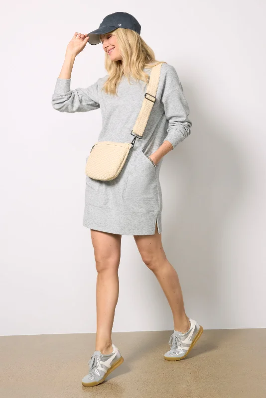 How to wear flowy dresses in layered winter outfits - -Rhodes Sweatshirt Dress